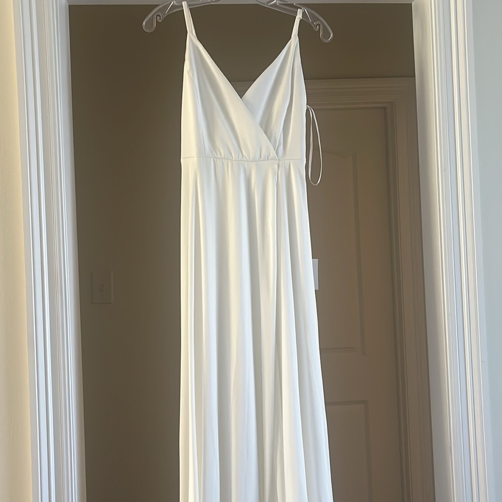 White silky long dress never worn size small, has a slit!